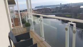 Century Wharf Apartments by Urban Space